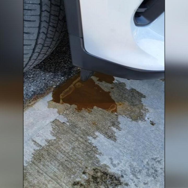 Oil on ground from leaking ISP Dodge Durango